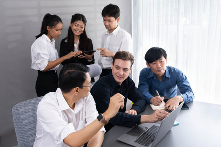 Group of diverse office worker employee working together on strategic business marketing planning in corporate office room. Positive teamwork in business workplace concept. Prudentの写真素材