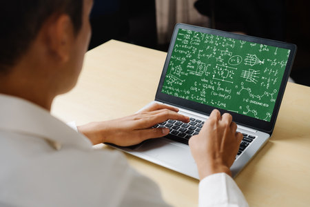 Mathematic equations and modish formula on computer screen showing concept of science and educationの写真素材