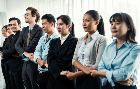 Modern diversity and multicultural company, business people joining hand together and standing in line, shared commitment to collaboration and cooperation concept background. Meticulousの写真素材
