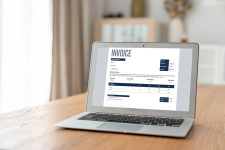 Invoice on computer screen from accounting application. Computer program for financial and budget of corporate business. Snugly.の写真素材