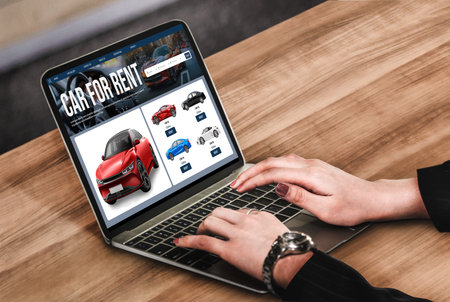 car rental website on computer screen for tourist to rent a car for transportation snugly