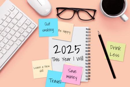 2025 Happy New Year Resolution Goal List and Plans Setting - Business office desk with notebook written about plan listing of new year goals and resolutions setting. Change and elation concept.の写真素材