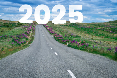 2025 New Year road trip travel and future vision concept . Nature landscape with highway road leading forward to happy new year celebration in the beginning of 2025 for elation and successful start .の写真素材