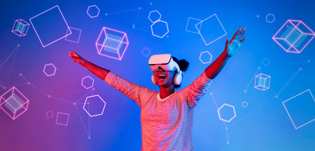 Person wearing VR glasses standing at blue and pink background and looking at floating geometric...