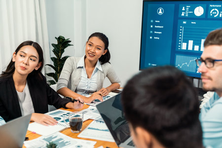Diverse group of business analyst team analyzing financial data report. Finance data analysis chart...