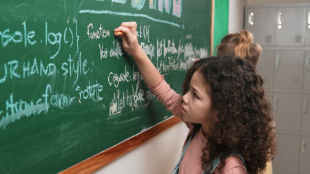 Student studying coding engineering prompt while writing answer on blackboard. Girl planning and learning about coding development plan. Child sharing idea. Pedagogy.の写真素材