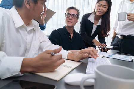 Group of diverse office worker employee working together on strategic business marketing planning in corporate office room. Positive teamwork in business workplace concept. Prudentの写真素材
