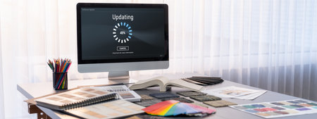 Interior designer workspace table and architecture software on laptop screen with mood board materials and colorful swatch color for color selection. Modern interior design office. Insightの写真素材