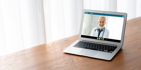 Doctor video call online by telemedicine software application for virtual meeting with patientの写真素材