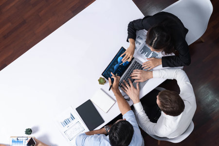 Group of office worker and businesspeople working on business financial data analysis. Empty space with editable blank background meeting table for customer design. Prudentの写真素材