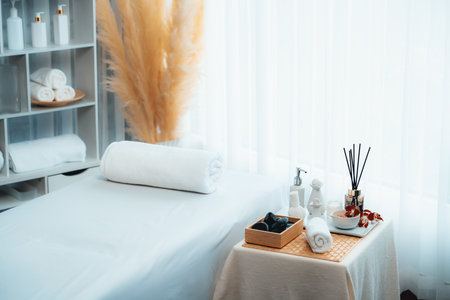 Exquisite display of beauty treatment and spa salon accessories arranged on spa table in luxury spa resort. Relaxing spa massage and recreation background concept. Quiescentの写真素材
