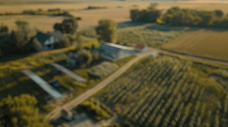 Blur background of industrial building with solar panels on the roof. Top view of eco house roof made from solar panel. Renewable energy and sustainability concept. Design for poster, banner.の写真素材