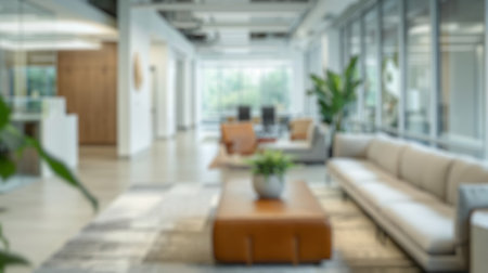 Blur background of room with large table and modern chairs. Workplace decorated with modern style. Minimalist and professional office design. Design for poster, wallpaper, banner.の写真素材
