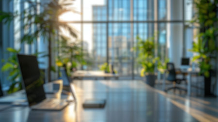 Blur background of spacious lobby with high ceilings and marble floors, adorned with indoor plants...