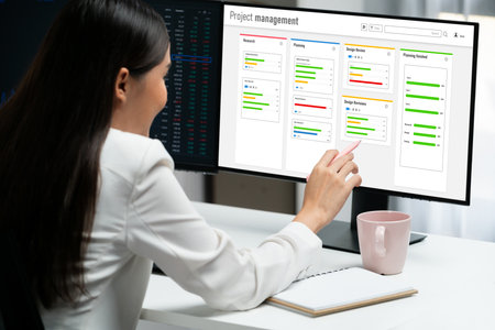 Project planning software for brisk business project management on the computer screen showing...