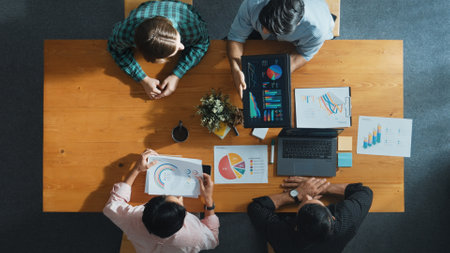 Top view of business team attend meeting while prepare working and analyzing data. Group of diverse people planning creative and working on start up project while team joining conference. Convocation.の写真素材