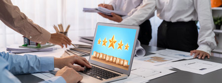 Group of interior architect designer discussing together on blueprint and laptop screen display architecture software for more precise designing layout. Modern home design and renovation. Insightの写真素材