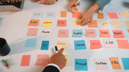 A vibrant collaborative environment featuring colorful sticky notes used for brainstorming,...