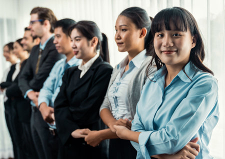 Modern diversity and multicultural company, business people joining hand together and standing in line, shared commitment to collaboration and cooperation concept background. Meticulousの写真素材