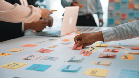 A dynamic office scene capturing a team engaged in a collaborative meeting, utilizing colorful...