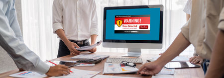 Virus warning alert on computer screen detected brisk cyber threat , hacker, computer virus and...