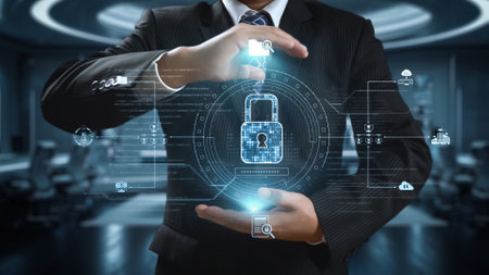 A professional businessman showcases a digital lock icon amidst technology symbols, representing cybersecurity and data protection in a modern office setup.の写真素材