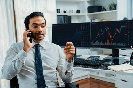 Trader businessman calling to consultant or partner with two stock exchange investment, compare data analysis to invest high profit value dynamic financial technology stock market at office. Surmise.の写真素材