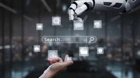 A sleek robotic hand reaches out to digital icons, showcasing an interactive interface in a futuristic setting. The image represents the integration of advanced technology and automation.の写真素材