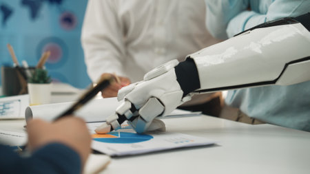 A robotic arm interacts with charts during a business meeting, symbolizing the integration of...