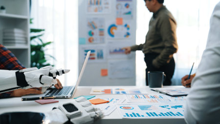 A modern office scene depicting a robot hand assisting in data analysis, showcasing charts and...