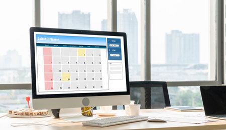 Calendar on computer software application for modish schedule planning for personal organizer and online businessの写真素材