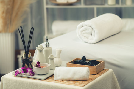 Exquisite display of beauty treatment and spa salon accessories arranged on spa table in luxury spa resort. Relaxing spa massage and recreation background concept. Quiescentの写真素材