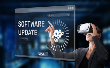 A business professional interacts with a virtual reality interface showcasing a software update, complete with progress indicators and gears, emphasizing technological advancement.の写真素材
