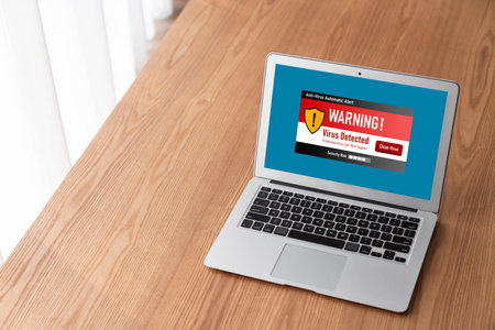 Virus warning alert on computer screen detected modish cyber threat , hacker, computer virus and...