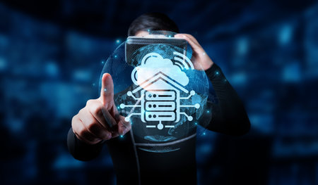 A visual representation of cloud computing featuring a digital server icon and a person interacting...