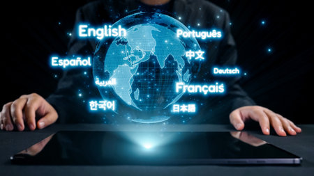 A visual representation of global communication, showcasing a digital globe surrounded by various language icons emerging from a tablet, emphasizing multilingual interaction and technology.の写真素材