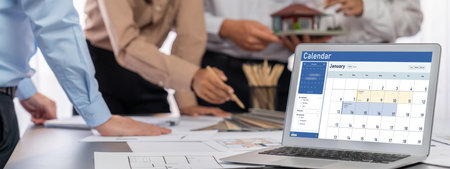 Group of interior architect designer discussing together on blueprint and laptop screen display for more precise designing layout. Modern home design and renovation. Insightの写真素材