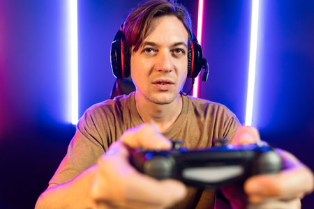 Enjoy smart gaming streamer with control joystick, playing game online of live streaming social...