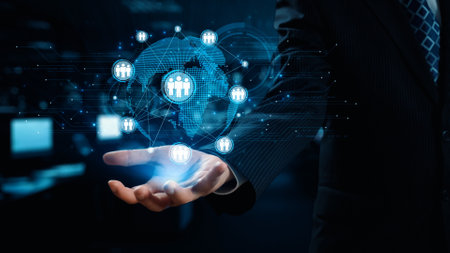 A professional businessman presents a digital network with glowing connections above his hand,...