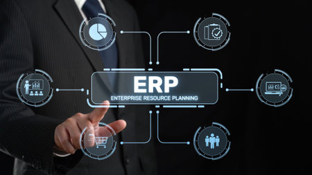 A professional wearing a suit engages with a digital interface, showcasing innovative technology for enterprise resource planning and data integration in a business setting.の写真素材