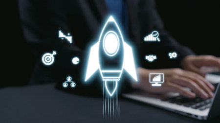 A sleek rocket symbolizing growth and innovation launches amidst various digital icons that represent strategy and success in modern business and technology contexts.の写真素材