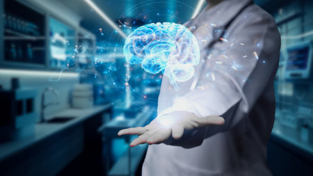 Close up of doctor holding glowing blue brain hologram at laboratory with blurring background. Skilled neurologist checking at brain holographic and diagnosis brain injury. Focus on hand. Remedial.の写真素材