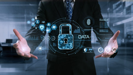 A businessman showcases a digital data security concept featuring a padlock and various security...