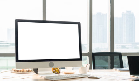 White empty screen on modish computer for your design mock up on the monitor display