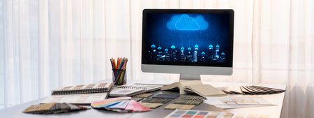 Interior designer workspace table and architecture software on laptop screen with mood board...
