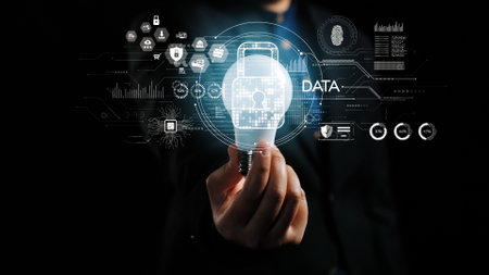 A professional hand holds a glowing padlock symbol, representing data security in a high-tech digital environment filled with futuristic graphic interfaces.の写真素材
