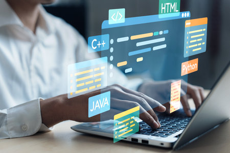 Software developer or programmer work with coding digital overlays of various programming languages...