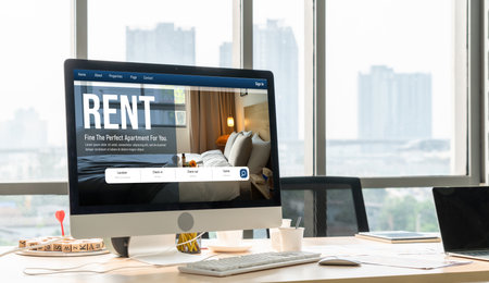 Online real estate rental search snugly on computer. House home or apartment rental website online.の写真素材