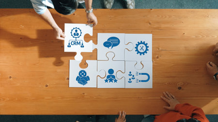 A dynamic scene capturing diverse individuals collaboratively assembling a puzzle with CRM-related...