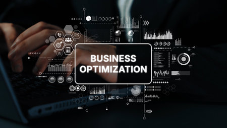 Business Optimization Concept Showing Hands Typing on Laptop Surrounded by Data Analytics and Charts. Asymptotic smart data analytic.の写真素材